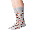Lifestyle shot showing the Foxy Groom socks on a person's legs.