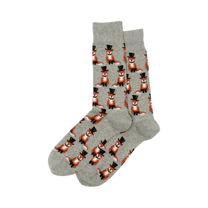 Pair of gray crew socks with a repeating pattern of orange foxes wearing black top hats and bow ties.