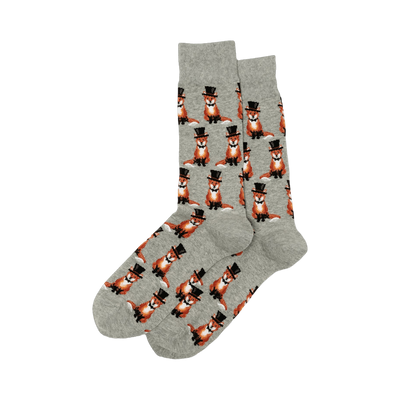 Pair of gray crew socks with a repeating pattern of orange foxes wearing black top hats and bow ties.