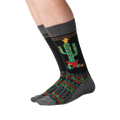 Lifestyle shot of a person wearing the Christmas Cactus Non-Skid Slipper socks.