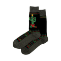 Pair of Christmas Cactus Non-Skid Slipper socks. Black with a decorated cactus image, geometric patterns, and grey cuffs.