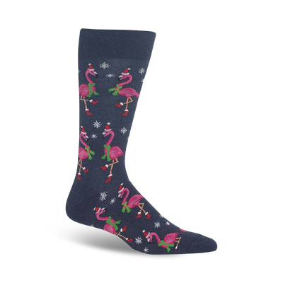 dark blue crew socks with a pattern of pink flamingos wearing santa hats, green scarves, and snowflakes - perfect for christmas.  