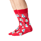 Lifestyle shot of a person's legs wearing red snowman socks.
