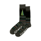 Pair of dark gray and black Christmas tree slipper socks. Features a festive tree, snowflake, and geometric patterns, plus non-skid grips on the soles.