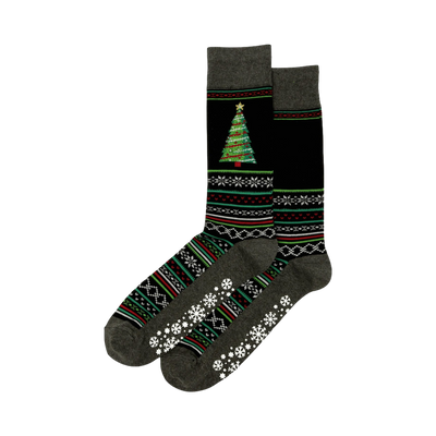 Pair of dark gray and black Christmas tree slipper socks. Features a festive tree, snowflake, and geometric patterns, plus non-skid grips on the soles.