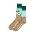 Pair of crew socks. Tan base with a light blue beach scene, surfing Santa, palm tree, presents, and 'Ho Ho Ho' print. Red and green cuffs.