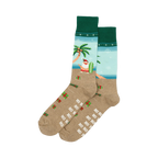 Pair of crew socks. Tan base with a light blue beach scene, surfing Santa, palm tree, presents, and 'Ho Ho Ho' print. Red and green cuffs.
