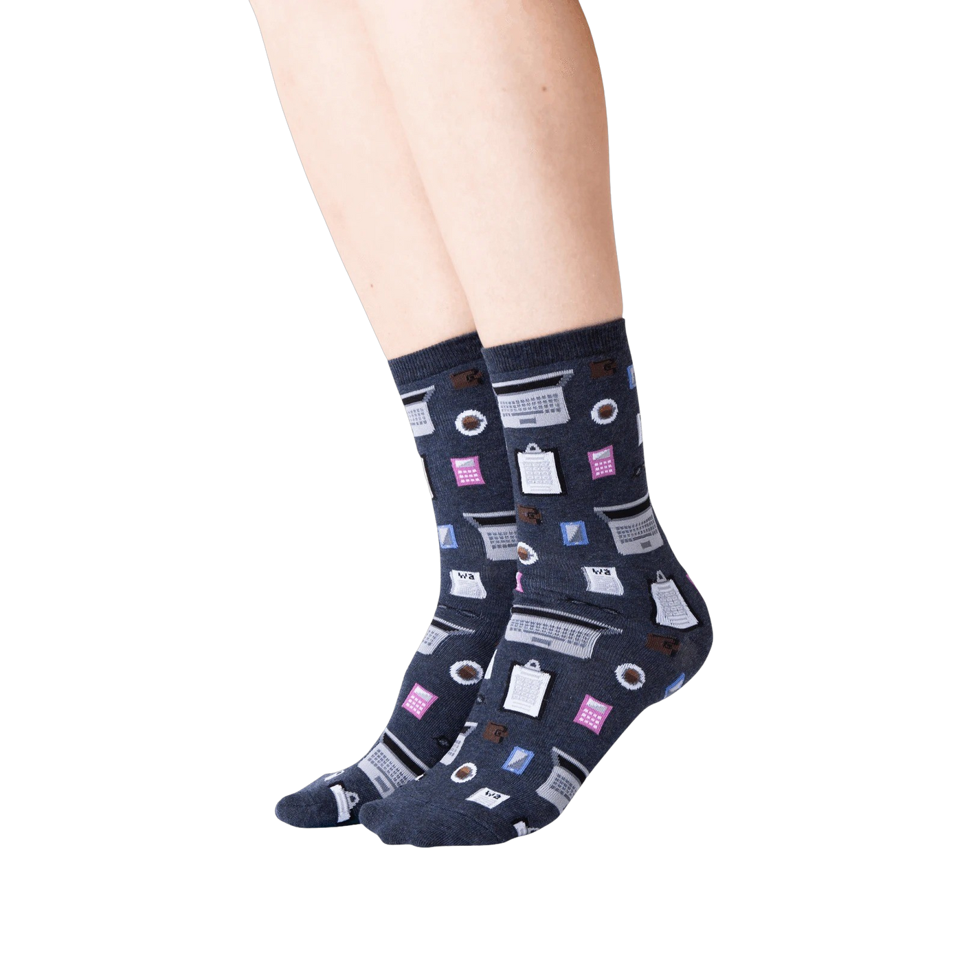 Lifestyle shot of woman's legs wearing dark gray Accountant socks. The socks are visible from the ankles down.