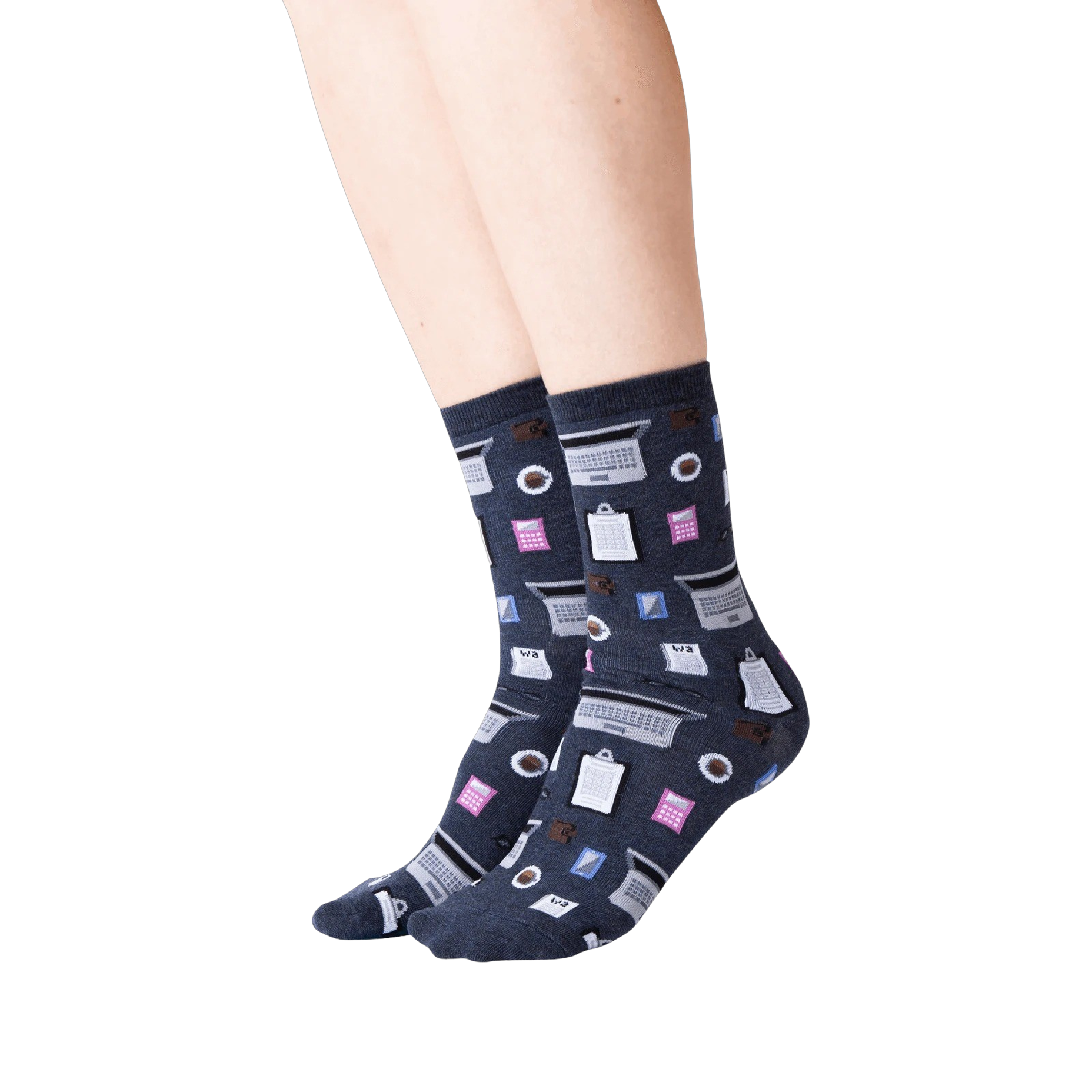Lifestyle shot of woman's legs wearing dark gray Accountant socks. The socks are visible from the ankles down.