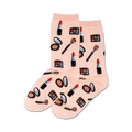Pair of peach crew socks featuring a pattern of lipstick tubes, eyeshadow palettes, makeup brushes, and compact powder. 