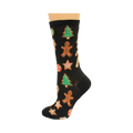 Black crew socks with a fun Christmas cookie pattern.  Gingerbread men, candy canes, stars, and Christmas trees are featured in red, green, and brown.