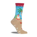 Beige non-skid slipper sock with a red cuff. Features Santa surfing, a palm tree, snowflakes, and presents on a beach scene.