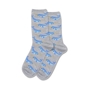 gray crew socks for women featuring a repeating pattern of blue narwhals with yellow horns.  