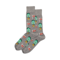 Pair of gray crew socks with a pattern of teal houses and red 'For Sale' signs and gold keys.