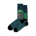 A pair of teal crew socks featuring a design of dogs playing poker around a green felt table under a green lamp.  Black toe and heel.