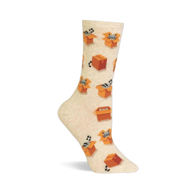 A single crew sock with a heathered cream background, patterned with grey cats peeking from orange cardboard boxes and small balls.