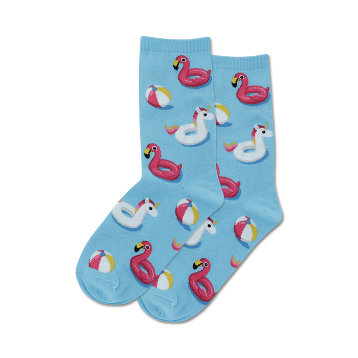 blue crew socks featuring multicolored flamingos, unicorns, and beach balls.  
