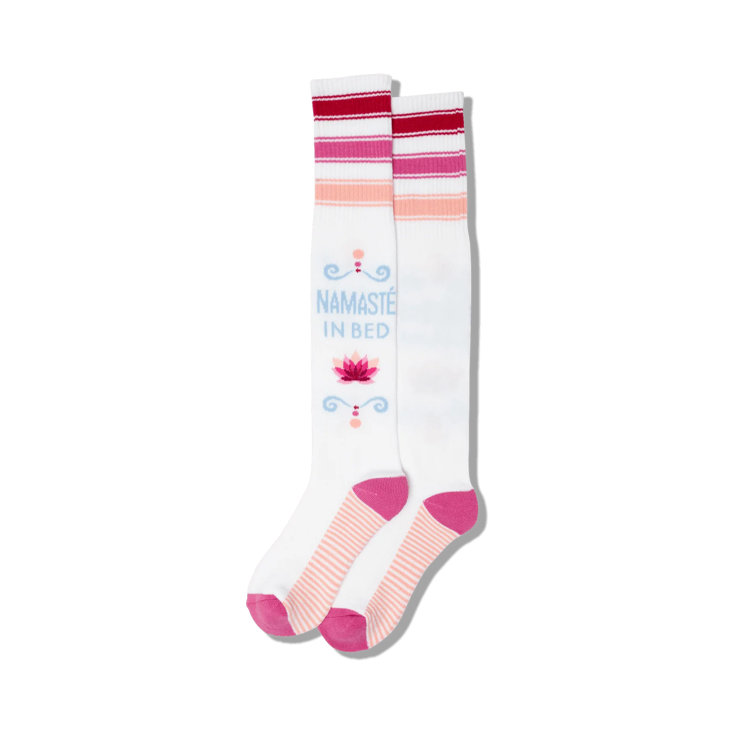 Pair of white knee-high socks with pink and red stripes, a lotus flower, and 'Namaste In Bed' text.