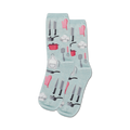Pair of light blue crew socks with a fun pattern of kitchen utensils in pink and gray.  Designs include knives, whisks, pots, and chef hats.