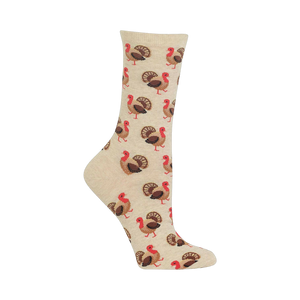 Close-up of a beige crew sock with a repeating pattern of brown and red turkeys.