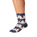 Lifestyle shot showing the socks on a person's legs. The socks are the focus.