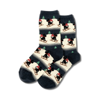 Cream and navy crew socks featuring a repeating pattern of black Scottie dogs sledding. Festive and fun!