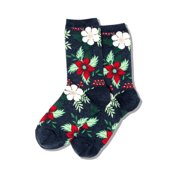 dark blue christmas crew socks for women feature red and white poinsettias, white dogwood flowers, and green leaves.   