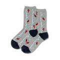 A pair of grey crew socks with a whimsical design of red cardinals on birch trees. The socks have navy blue cuffs.