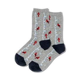 women's crew socks featuring red cardinals on snowy birch trees, perfect for the christmas season. dark blue toes and heels.   