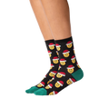 Lifestyle shot of a person wearing the Santa Smile Emoji socks. Shows how the socks look on the feet.