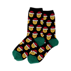 Pair of black crew socks.  Feature a repeating pattern of yellow smiley faces wearing red Santa hats. Green cuffs.