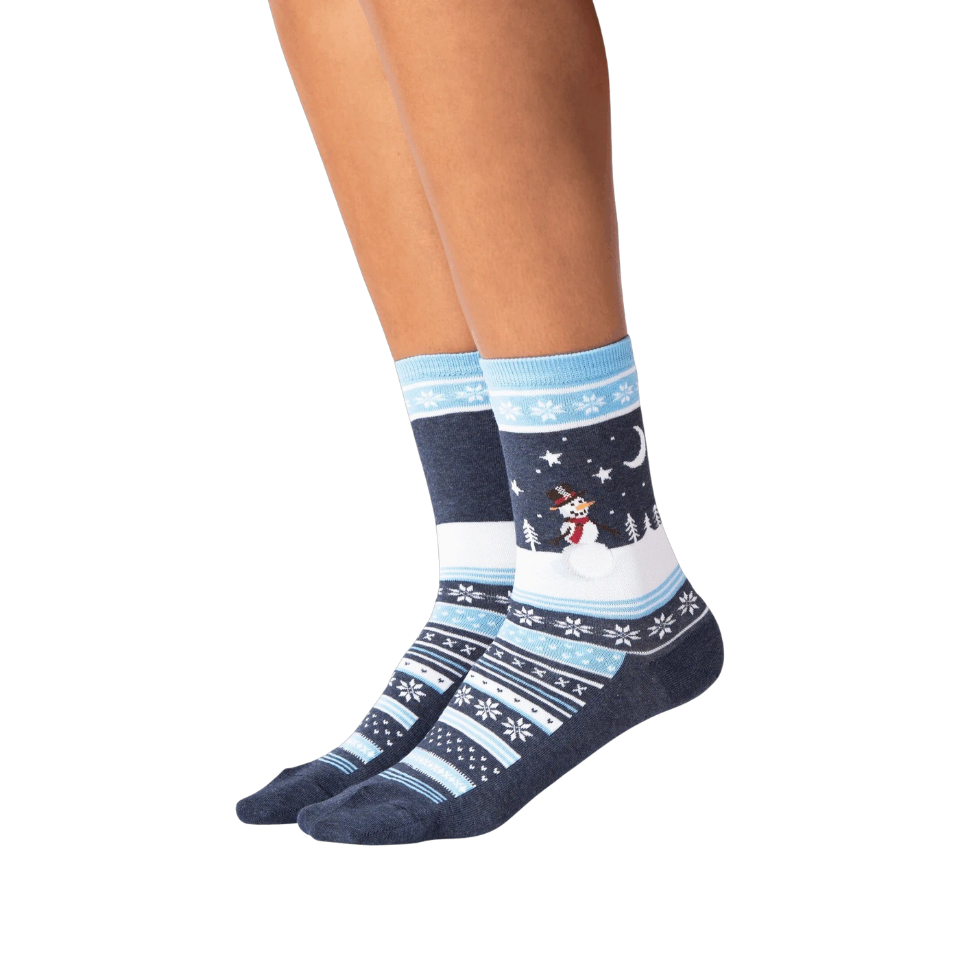 Lifestyle shot showing the socks on a person's legs against a black background.