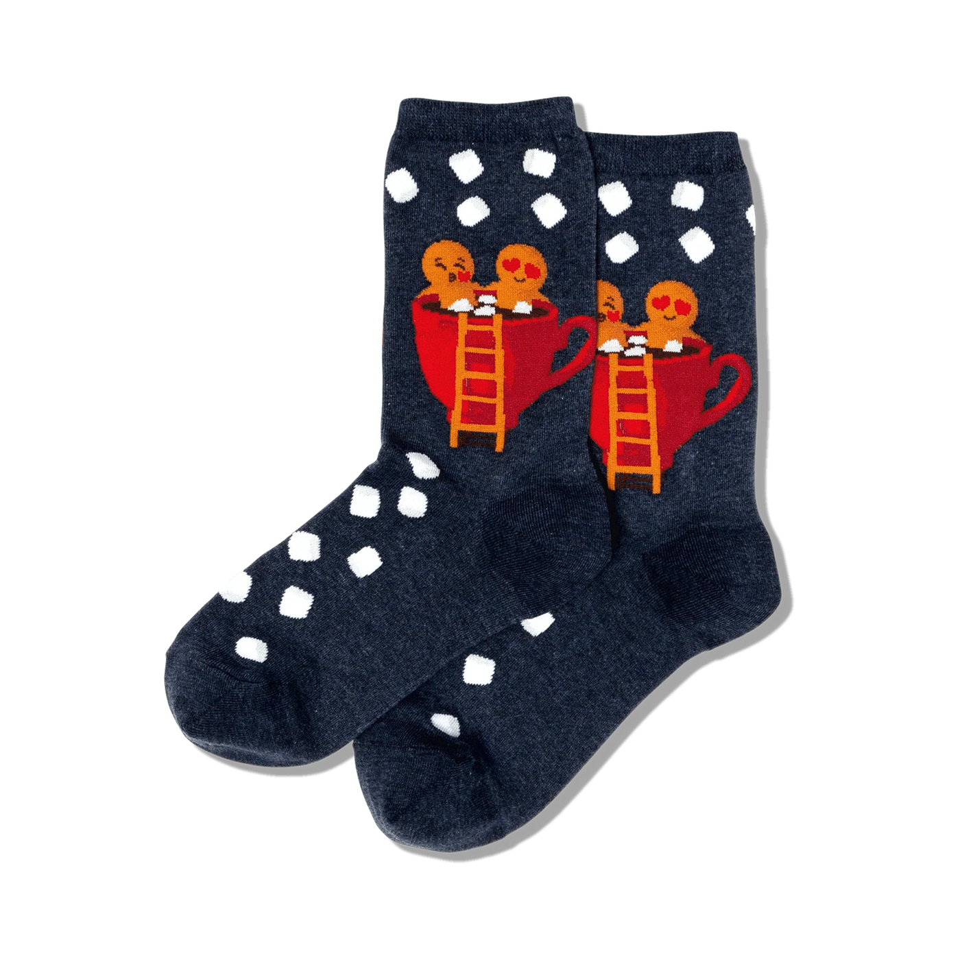 Pair of dark blue crew socks with white polka dots. Features a design of two gingerbread people in a red mug of hot cocoa.
