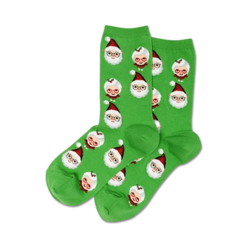 Pair of women's crew socks; bright green with repeating pattern of illustrated Santa and Mrs. Claus faces wearing glasses and red hats.