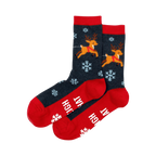 Pair of dark gray crew socks with red cuffs and toes. Reindeer pulling a sleigh and snowflakes are featured in the design.
