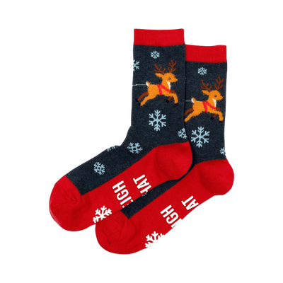 Pair of dark gray crew socks with red cuffs and toes. Reindeer pulling a sleigh and snowflakes are featured in the design.
