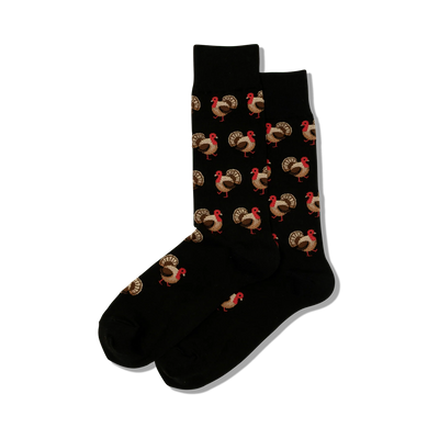 Pair of black crew socks with a repeating pattern of brown and red turkeys. Fun and festive!