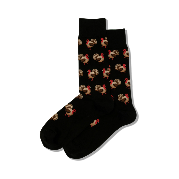 mens black crew socks feature red turkey cartoon pattern, perfect for thanksgiving.   }}