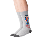 Lifestyle shot of a person wearing the Nutcracker socks.  Shows how the socks look on feet.
