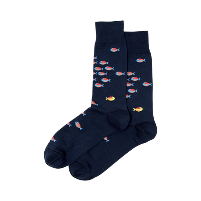 Pair of navy blue crew socks featuring a pattern of small, colorful fish in orange, red, and blue.  A few yellow fish are also visible.