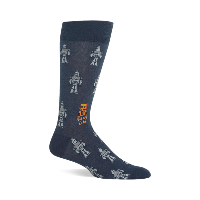 A single dark blue crew sock with a repeating pattern of light grey pixelated robots and one standout orange robot. }}