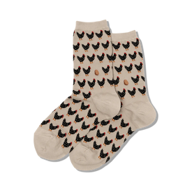 womens crew socks with black chickens, red combs and feet and small brown eggs on beige background. fall theme.   