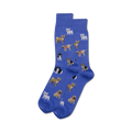 Lifestyle shot showing the blue 'Dogs of the World' socks on a person's feet.