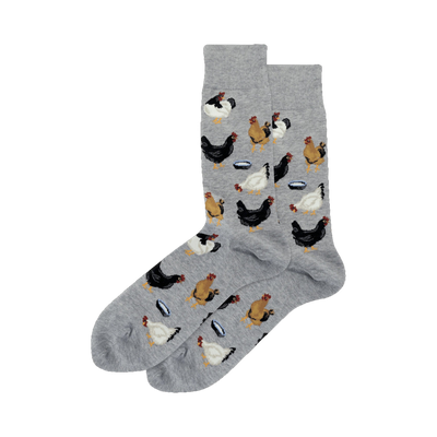 Pair of crew socks; gray and light blue options shown.  Features a repeating pattern of black, brown, and white chickens near small bowls.