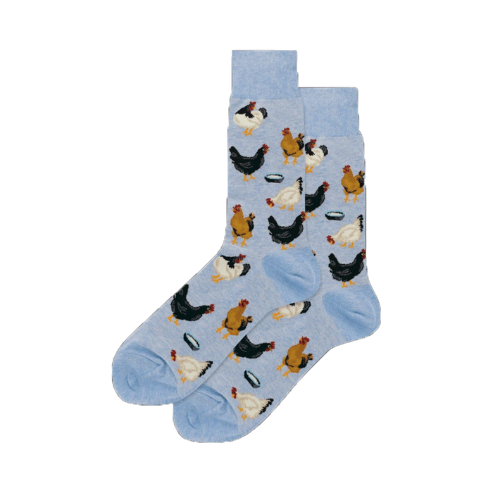 Lifestyle shot showing a pair of the light blue 'Feeding Chickens' socks.