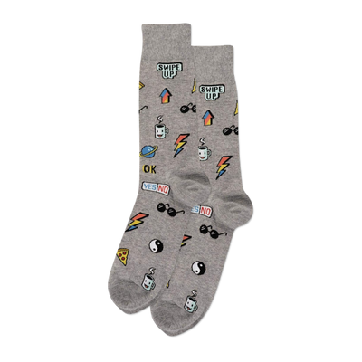 A pair of grey crew socks covered in small, colorful pixelated stickers including "SWIPE UP", sunglasses, and pizza slices.
