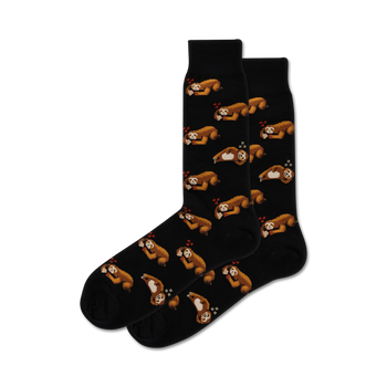mens crew socks with a black background and pattern of sloths holding heart-shaped pizzas in their arms; featuring brown sloths with cream-colored faces and black claws.  