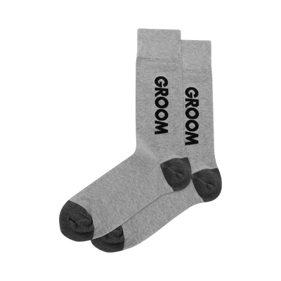 Pair of men's gray crew socks with dark gray heel and toe. The word "GROOM" is vertically printed on the side in black.