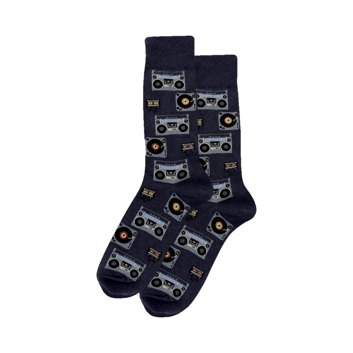Pair of crew socks in navy blue.  The socks have an all-over print of retro boomboxes and vinyl records in muted colors. }}