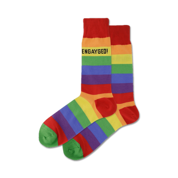rainbow socks with "engayged!" in black text, green toes and heels. perfect for pride.  